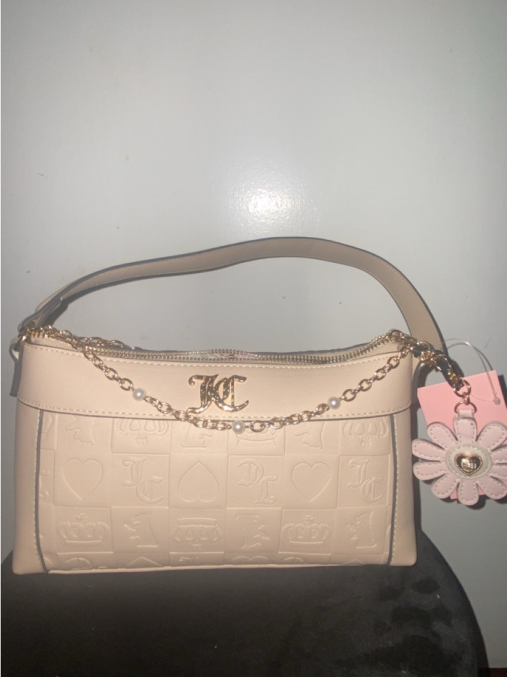 Juicy Couture Elegant Cream Shoulder Bag with Gold Chain and Monogram Charm